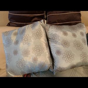2 Decorative pillows- light blue w/brown design